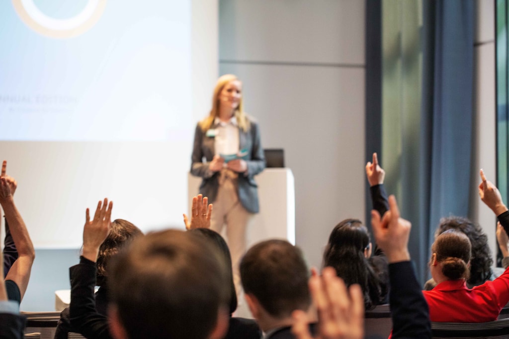 A photo of a woman giving a speech