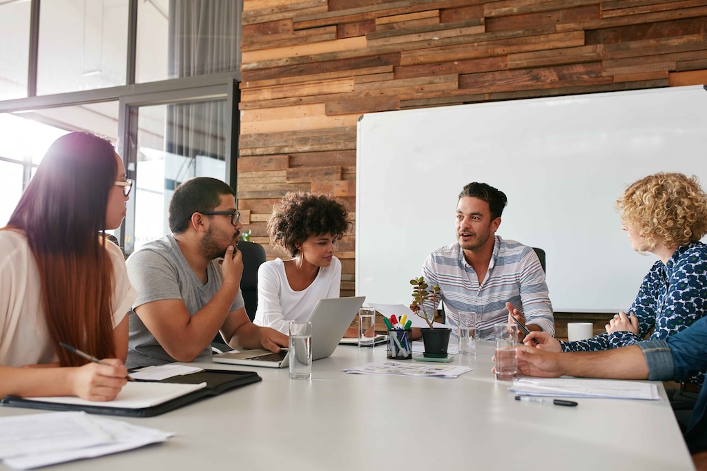 A photo of group of people discussing something