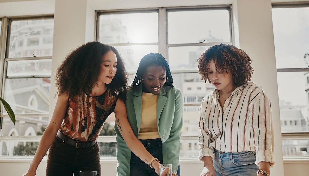 10 characteristics of a successful business plan Teamwork, planning and management black woman with documents, paperwork or design strategy in office. Business startup, gender equality and marketing ideas of diversity people in meeting planning