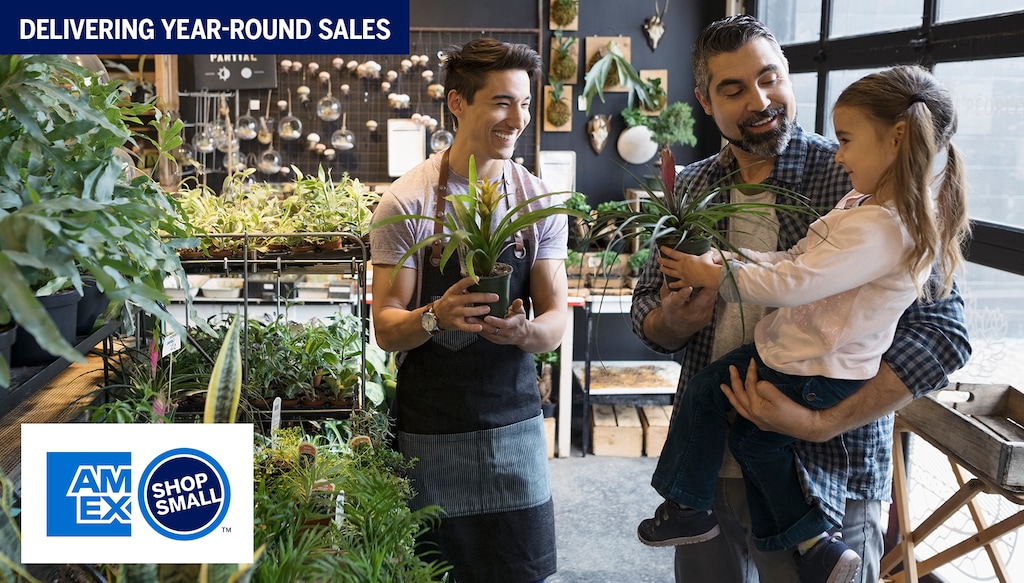 man and daughter in a plant store