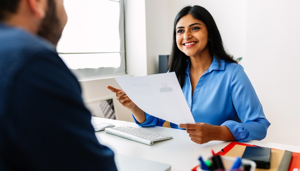 hr rep checking resume during an interview