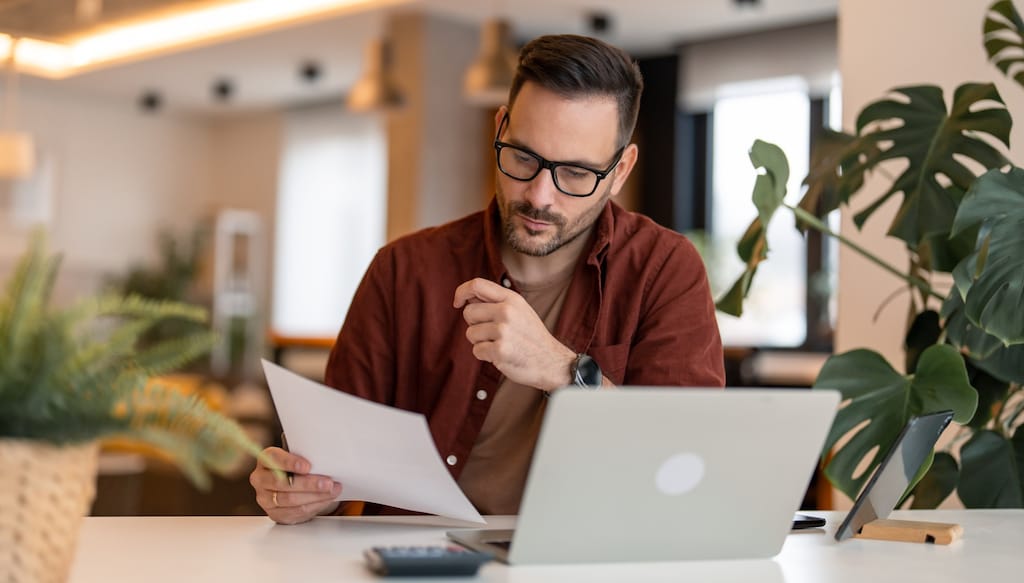 man checking financial data