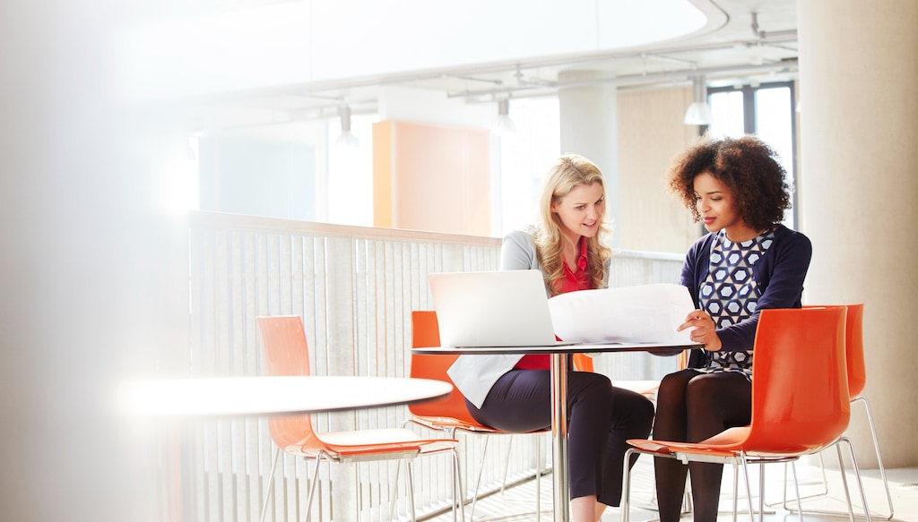 two colleagues in meeting room