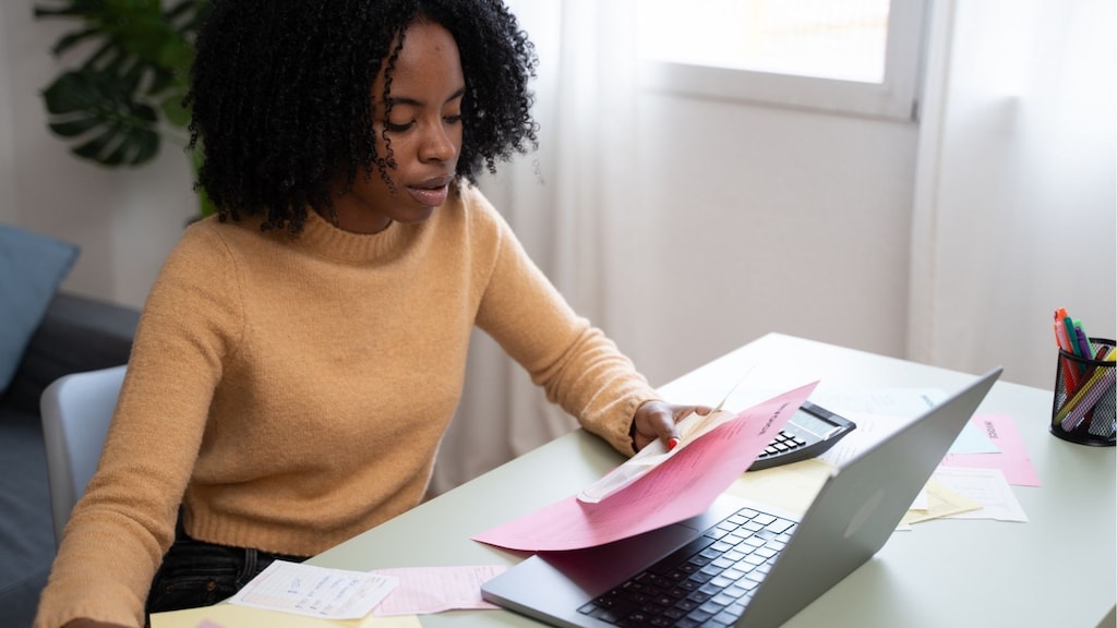 woman sorting through expenses