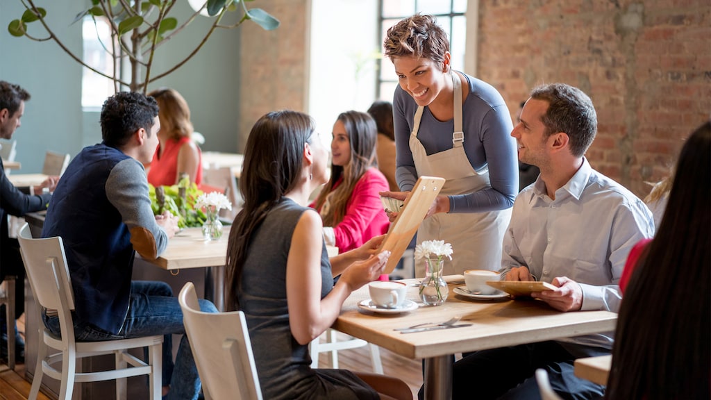 Couple ordering at a restaurant