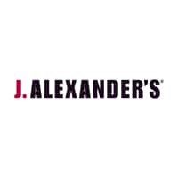 J.